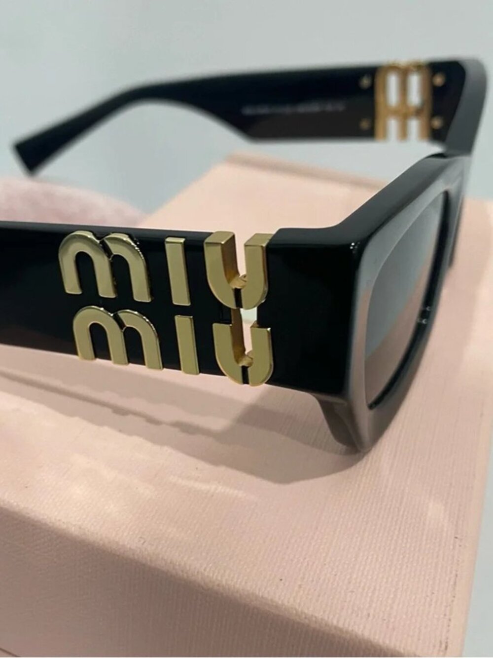 Miu Miu Black Sunglasses with Gold Detail - Picture 5 of 5